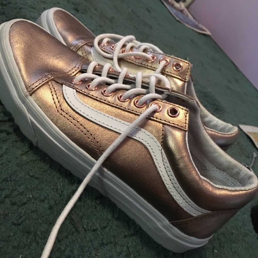 Leather gold Vans.